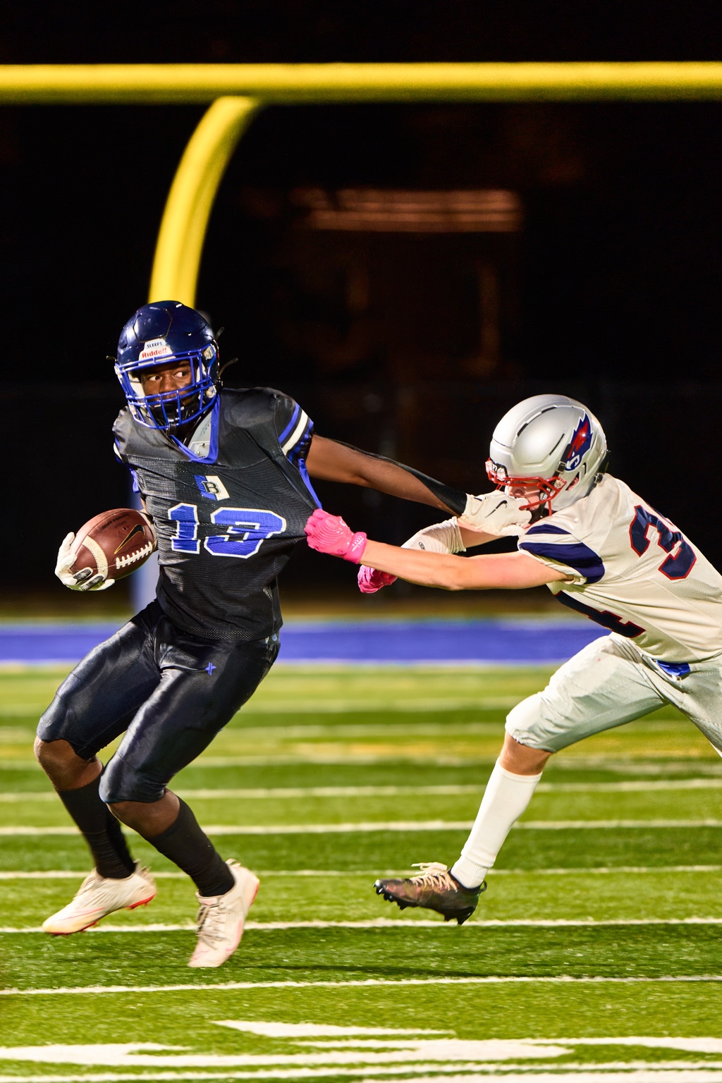Bandits football player avoiding a tackle